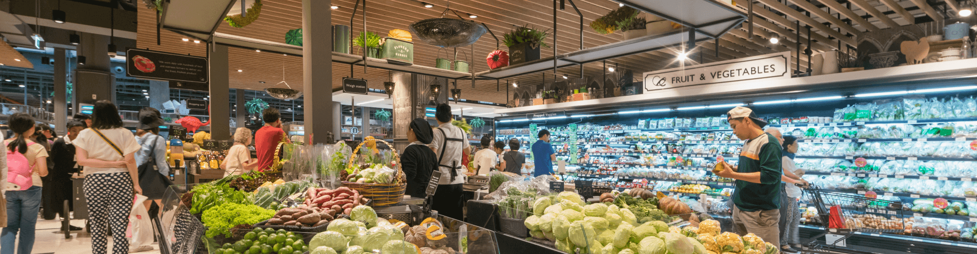 Shoppers in the fruit and vegetable aisle